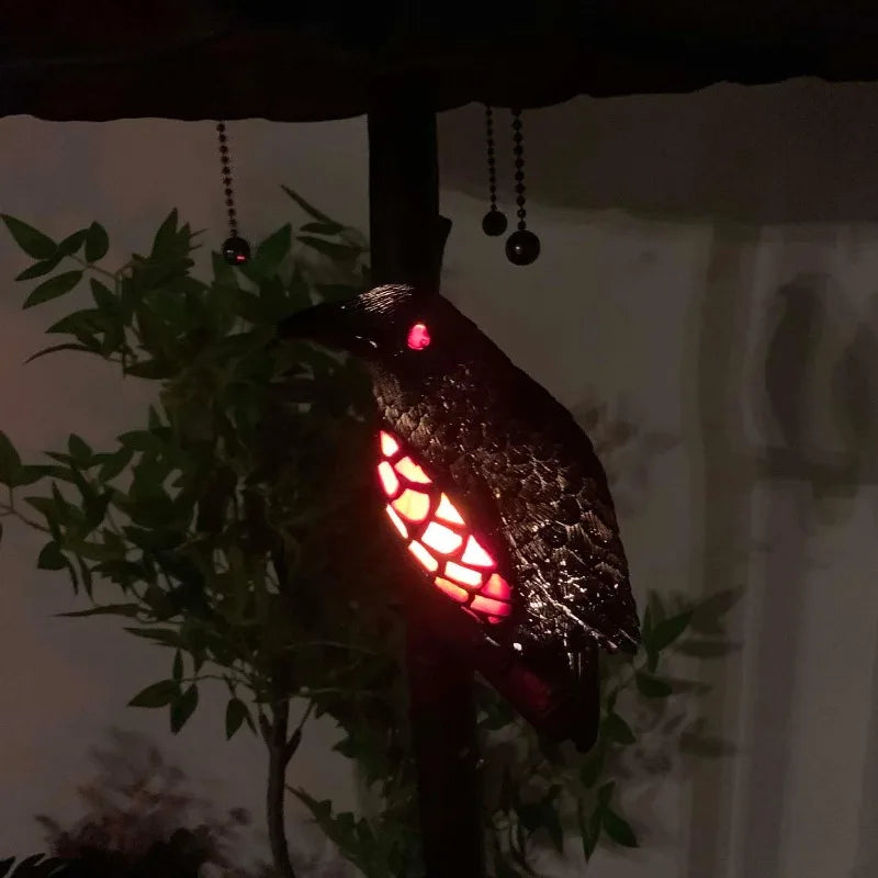 Raven Sitting On Bare Tree Branch Light Light